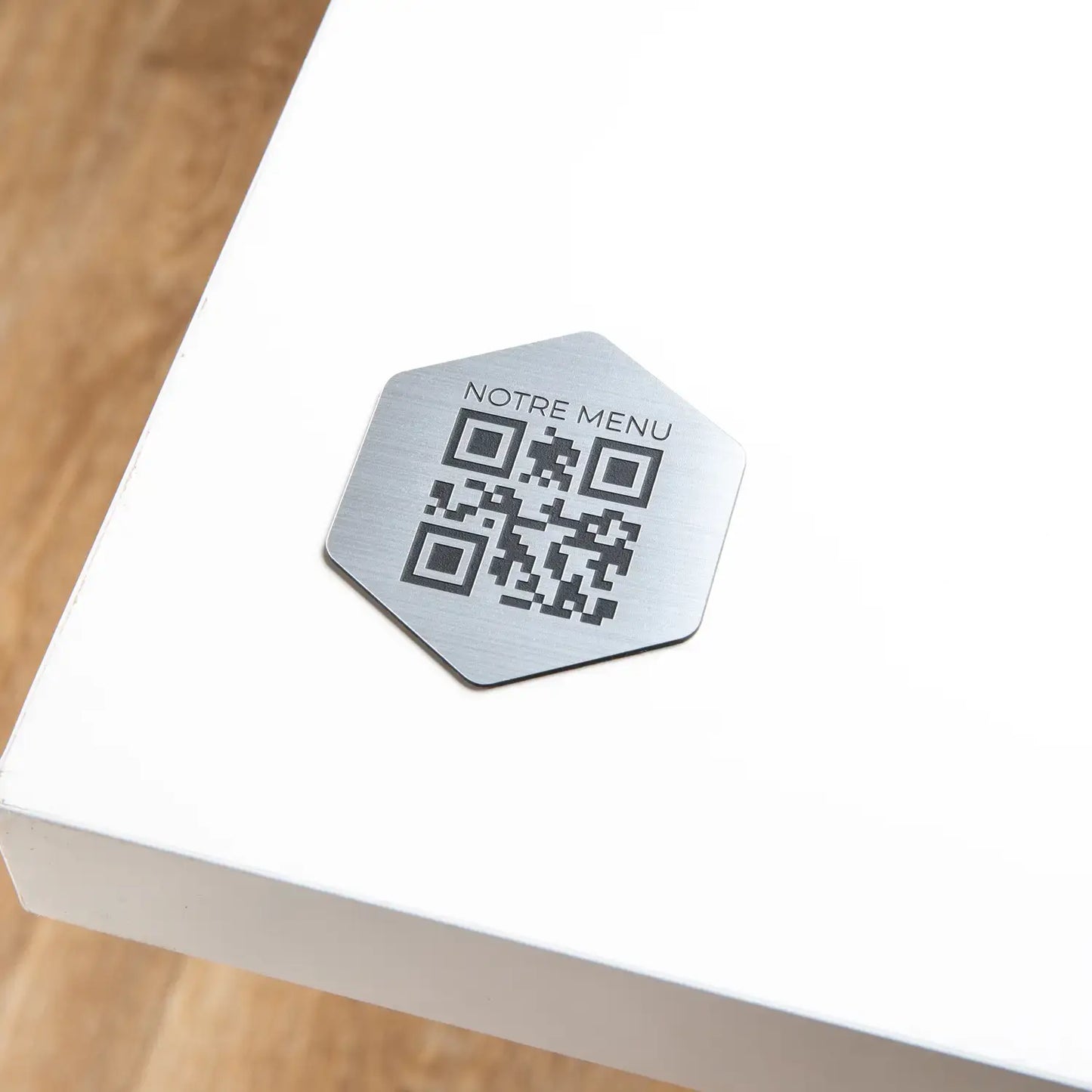 Hexagonal QR code plate with phrase