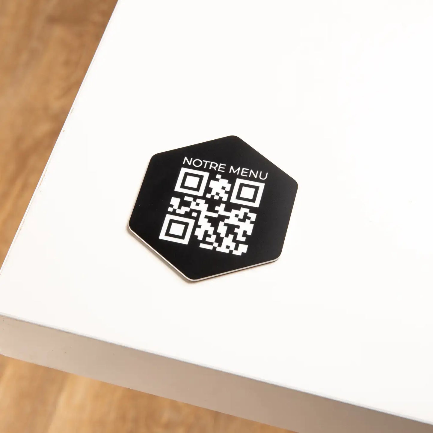Hexagonal QR code plate with phrase