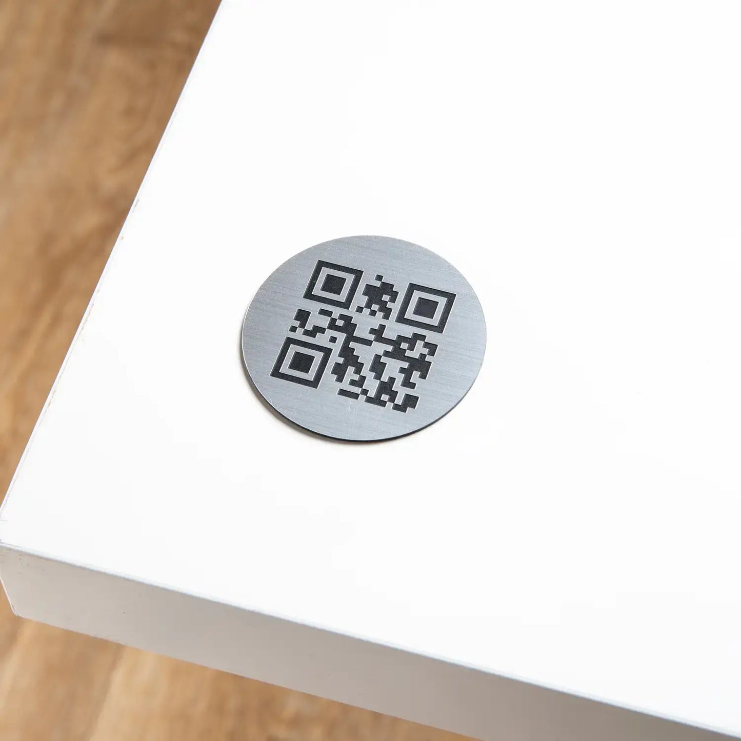 Engraved round QR code plate