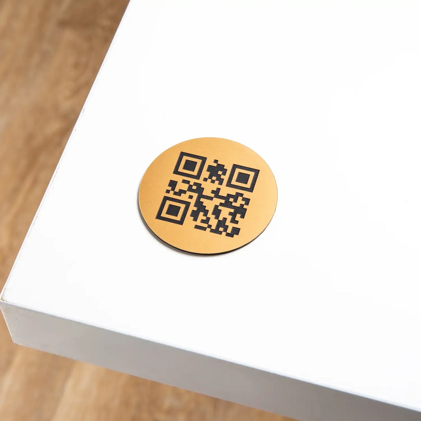 Engraved round QR code plate